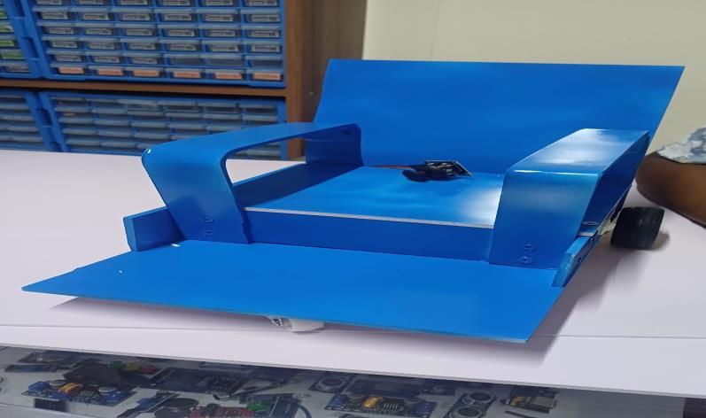 Blue prototype of the voice-controlled wheelchair